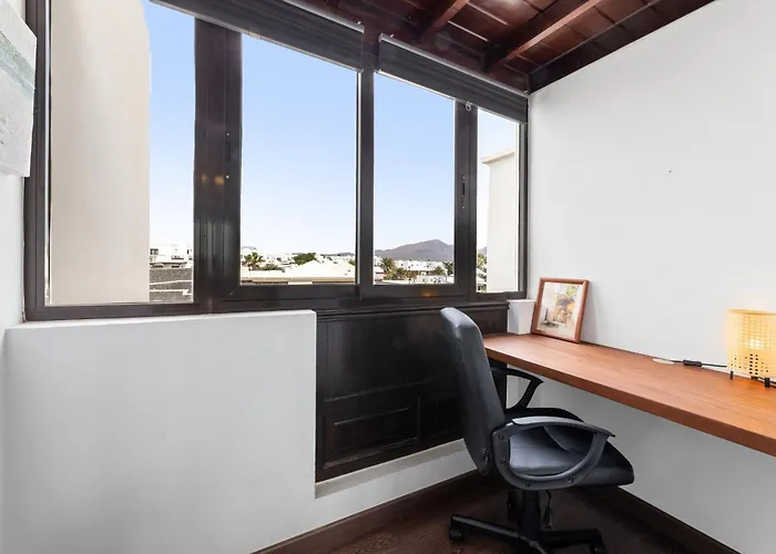 Сasa de vacaciones Cosy Villa Alegranza 105, Communal Pool, Private Garden *