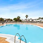 Cosy Alegranza 105, Communal Pool, Private Garden